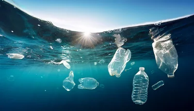 Plastic Bottles And Waste Floating In The Ocean