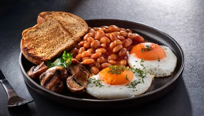 Traditional English Breakfast With Eggs Beans And Toast