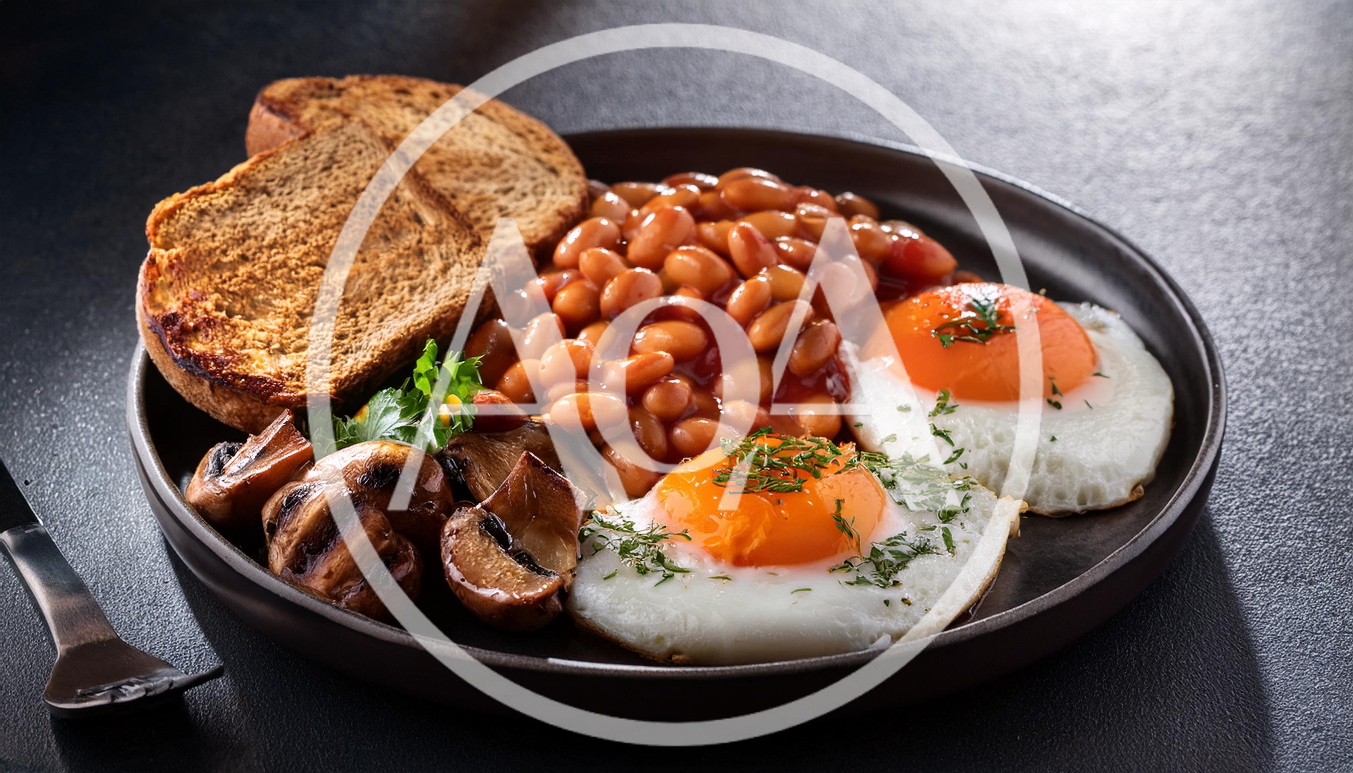 Traditional English Breakfast With Eggs Beans And Toast