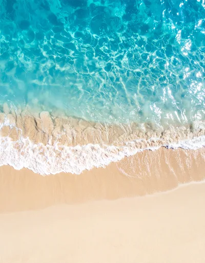 Aerial View Of Tropical Beach Shoreline