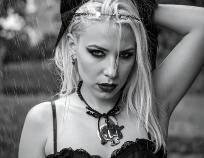 Gothic Woman Posing In The Rain
