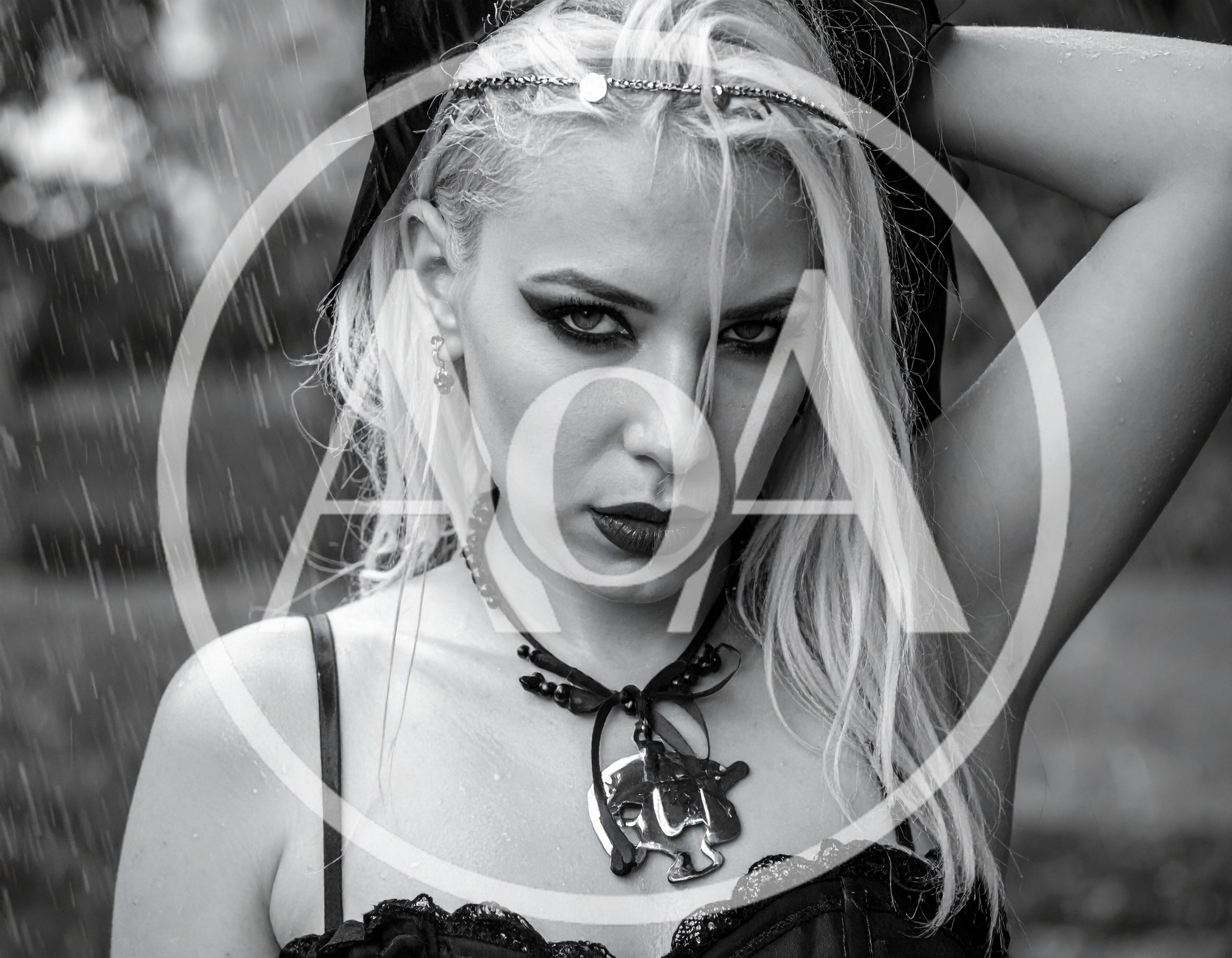 Gothic Woman Posing In The Rain