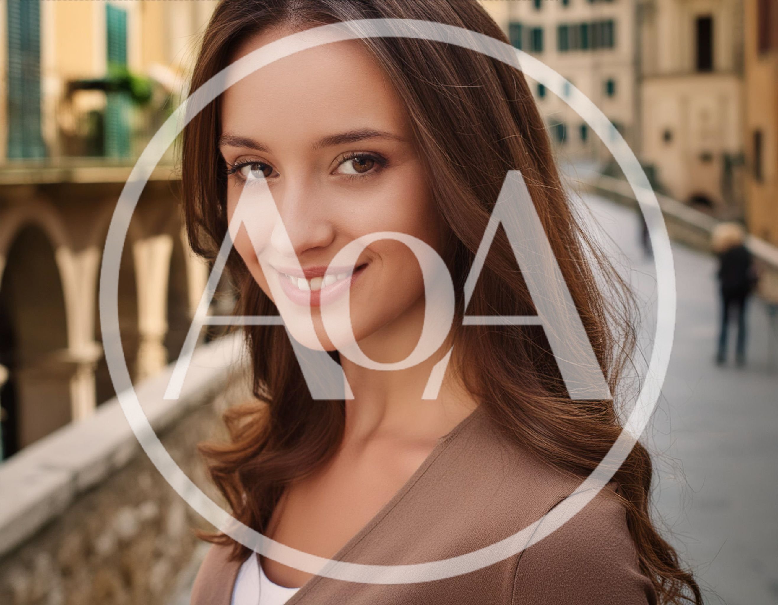 Portrait Of A Smiling Young Woman Outdoors
