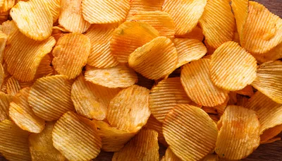 Top View Of Crispy Ridged Potato Chips