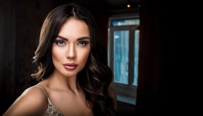 Portrait Of A Beautiful Woman With Wavy Hair