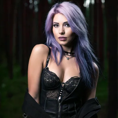 Portrait Of A Woman With Purple Hair In Forest