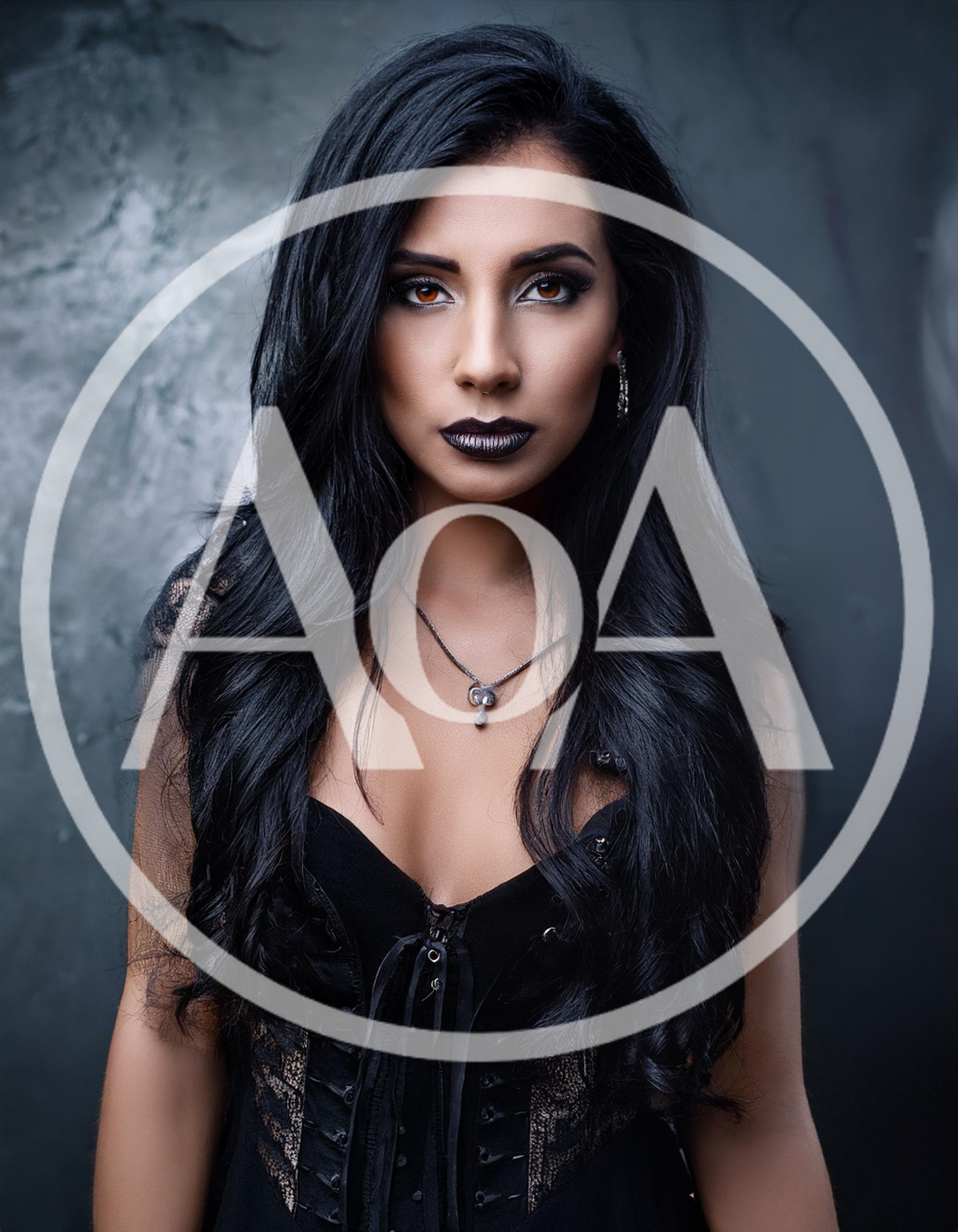 Gothic Woman With Long Black Hair And Dark Makeup
