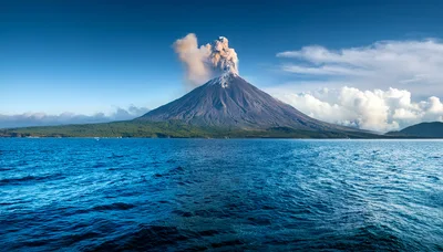Erupting Volcano Rising Above The Ocean Surface