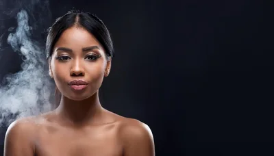 Portrait Of A Beautiful Woman With Smoke