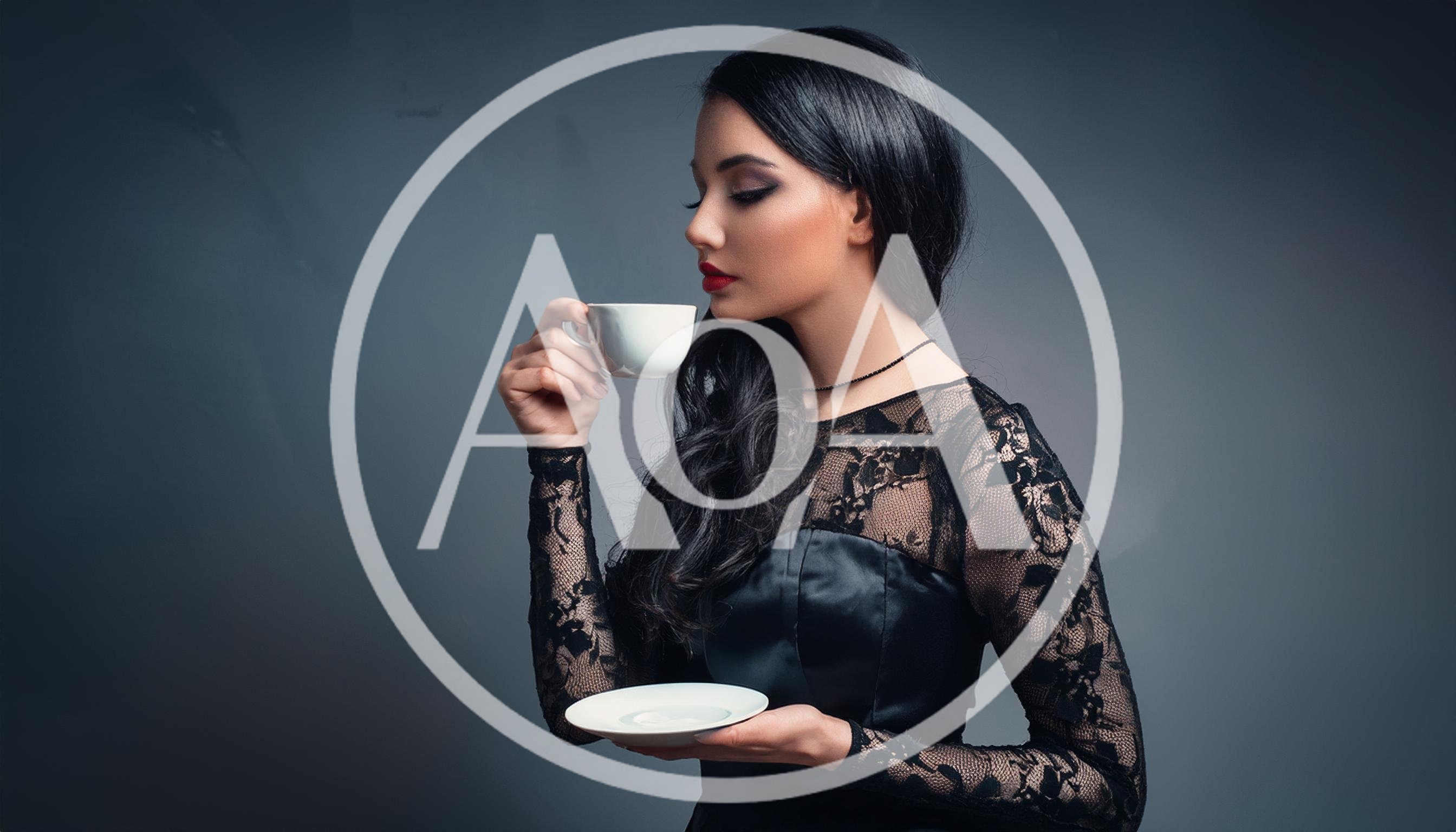 Elegant Woman Drinking Tea In A Black Lace Dress