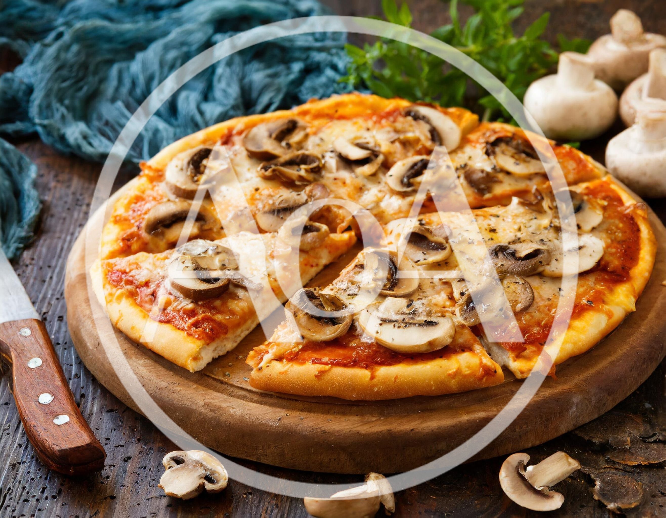 Fresh Mushroom Pizza On A Wooden Serving Board