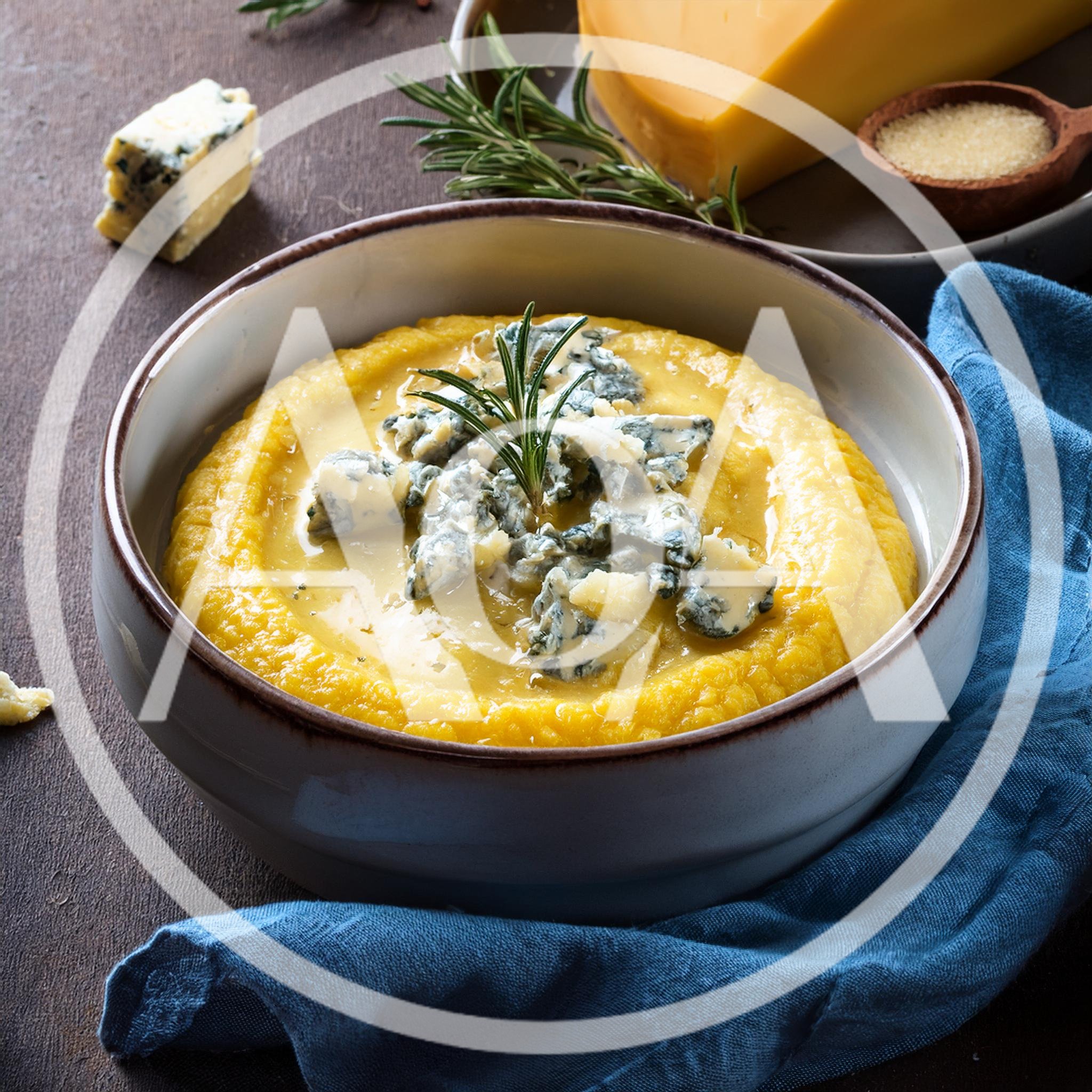 Creamy Polenta Topped With Gorgonzola Cheese And Rosemary