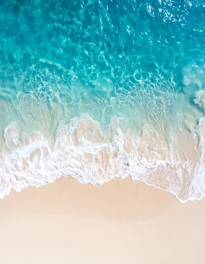 Aerial View Of Tropical Beach Waves