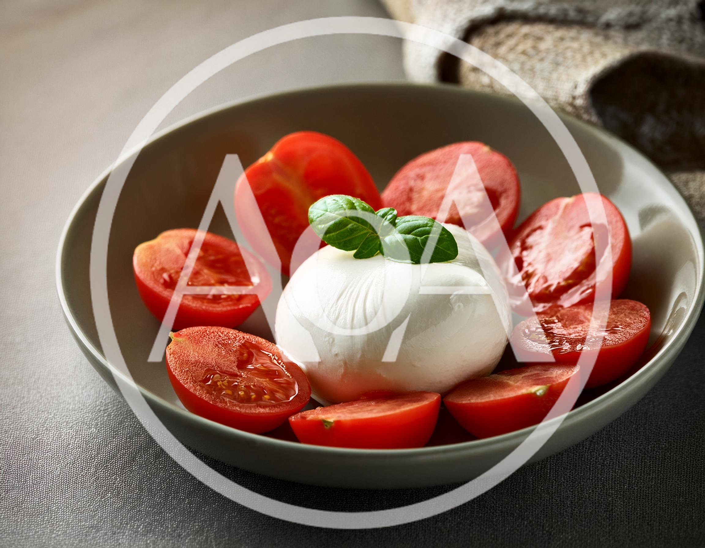 Fresh Mozzarella Cheese Ball With Sliced Tomatoes