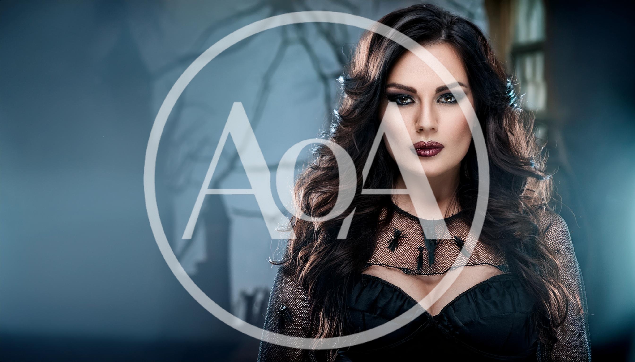 Beautiful Woman Dressed As A Witch For Halloween