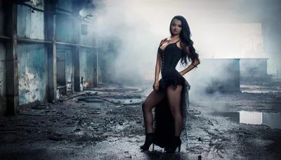 Fashion Model Posing In A Dark Industrial Warehouse