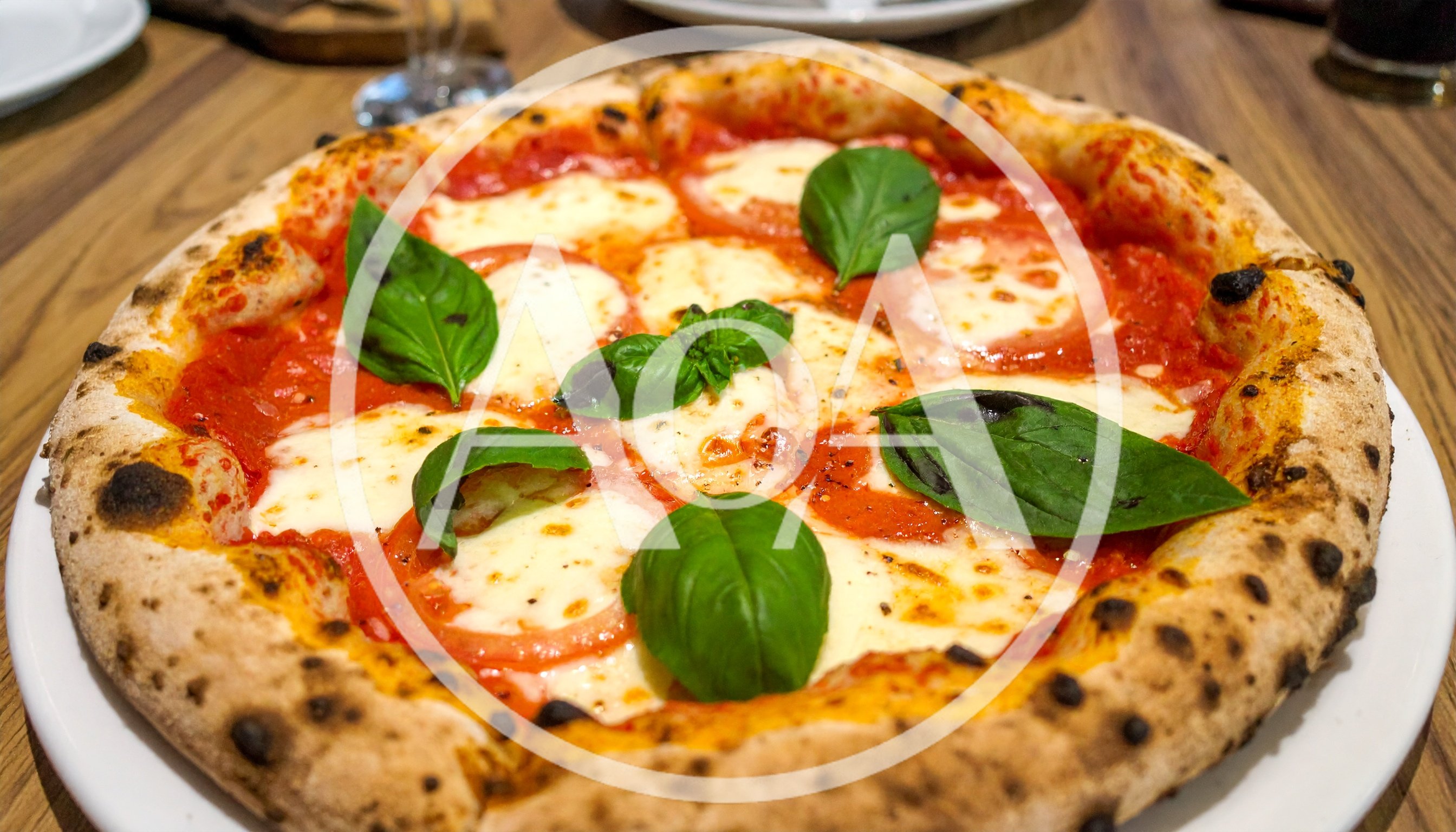 Fresh Margherita Pizza With Basil Leaves