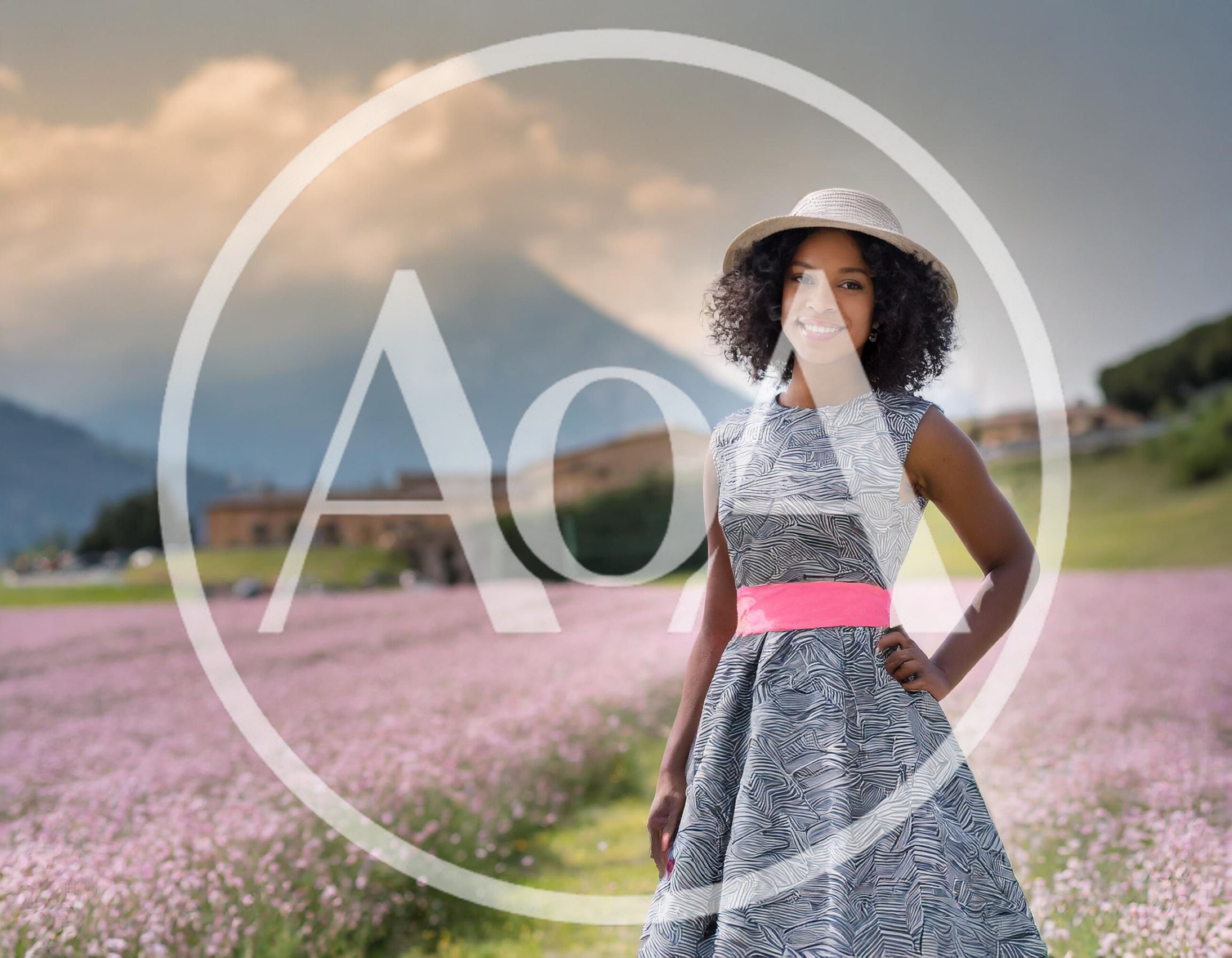 Young Woman Standing In A Blooming Lavender Field