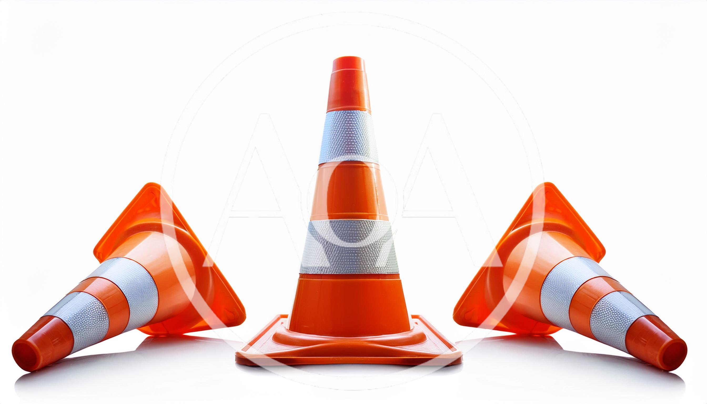 Three Orange Traffic Cones On White Background