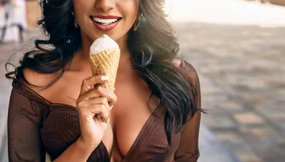 Woman Holding Ice Cream Cone Outdoors