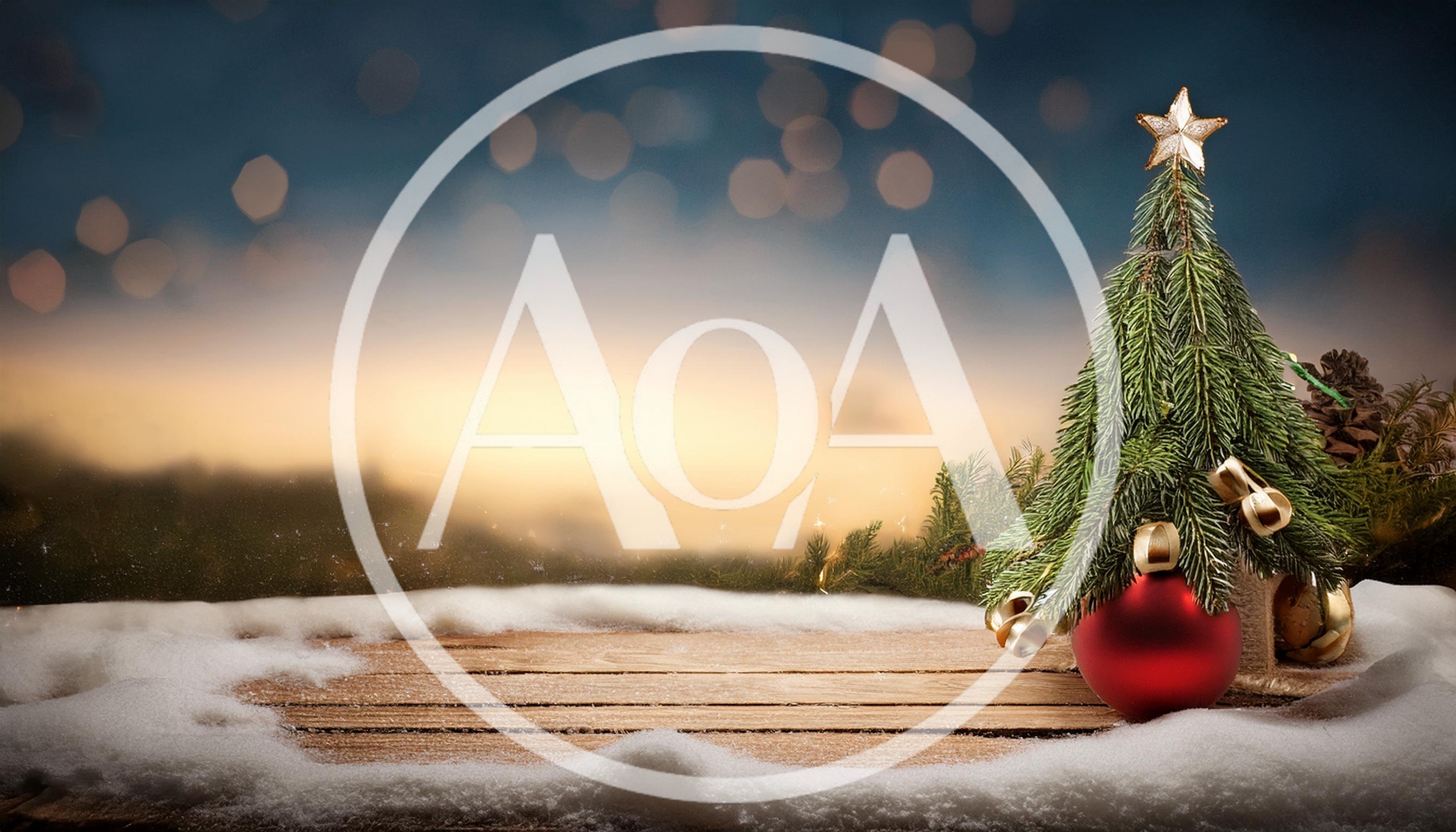Small Christmas Tree With Red Ornament On Snowy Table
