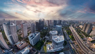 Aerial View of Modern City Skyline at Sunset