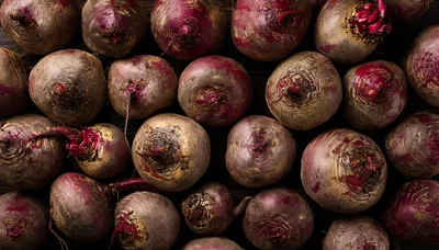 Fresh Raw Beetroots Arranged On A Dark Wooden Surface
