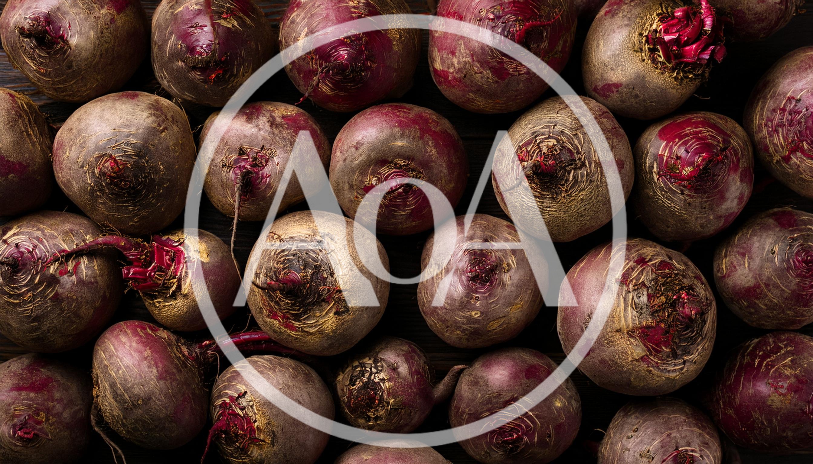 Fresh Raw Beetroots Arranged On A Dark Wooden Surface