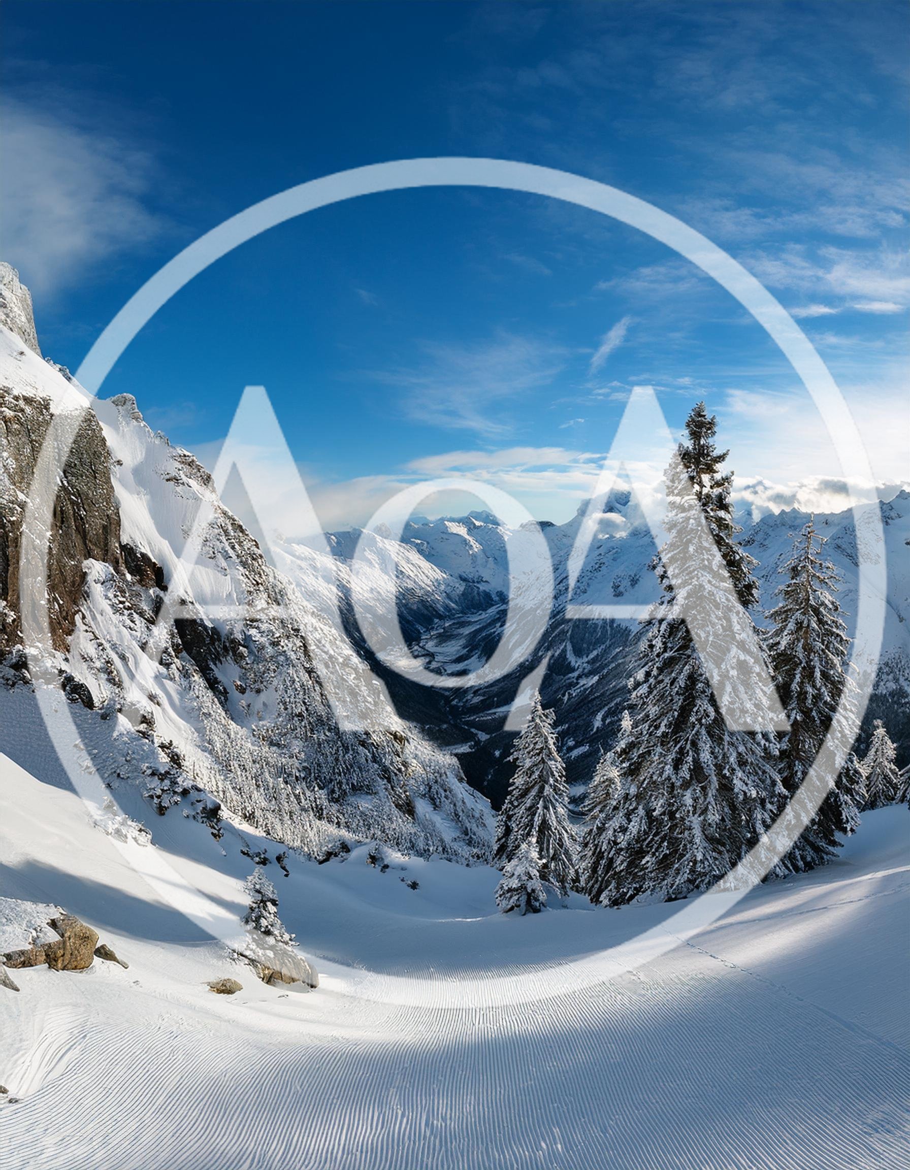 Snowy Mountain Landscape With Groomed Ski Slope