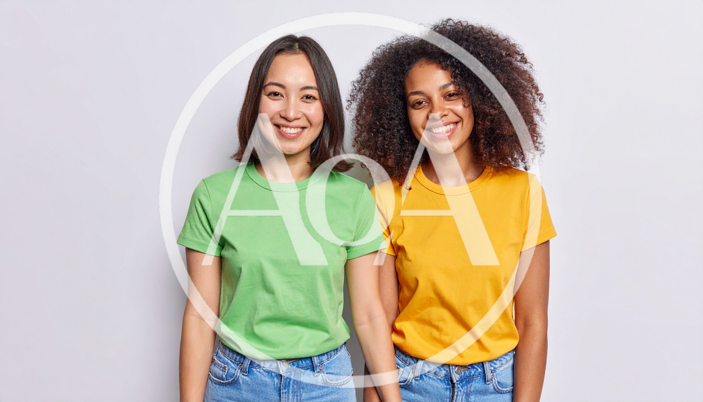 Two Diverse Young Women Smiling Together