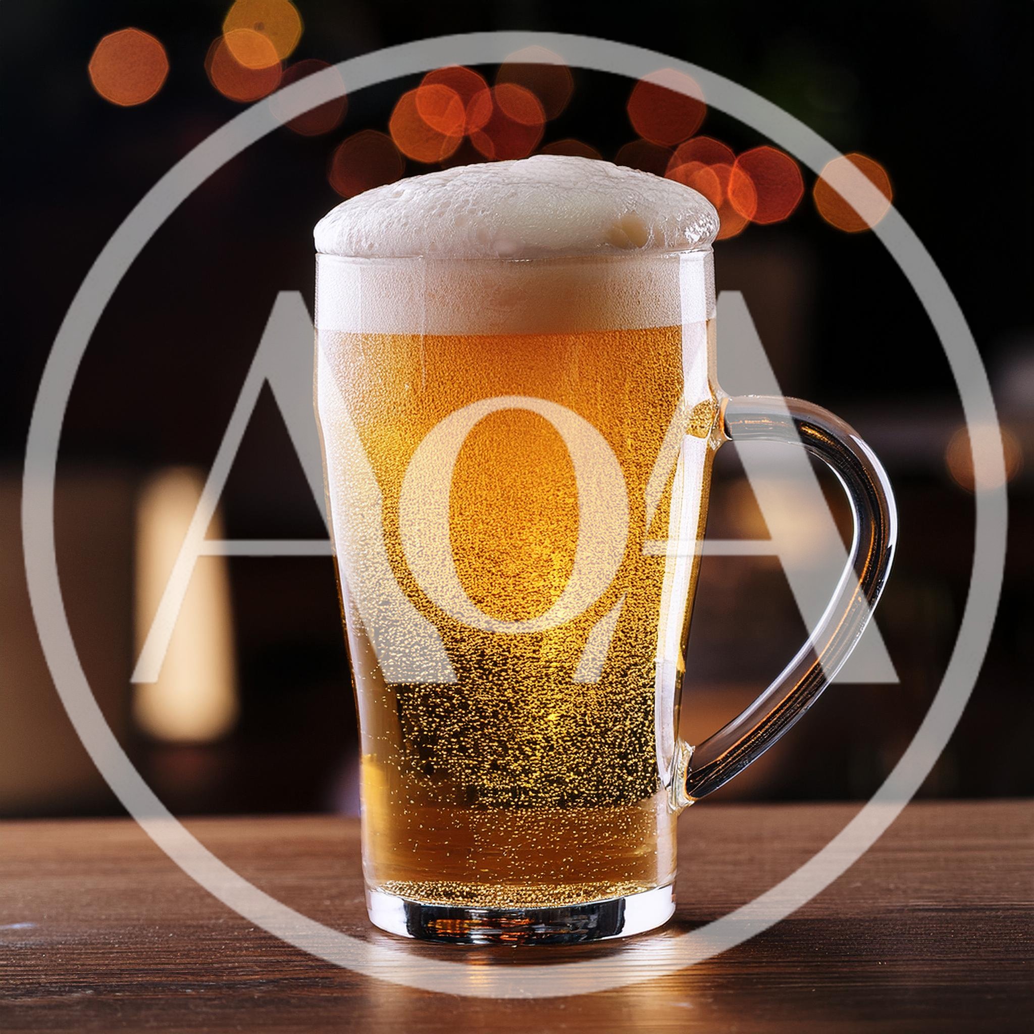 Glass Of Cold Beer On A Wooden Bar Counter