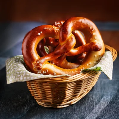 Freshly Baked Soft Pretzel In A Wicker Basket