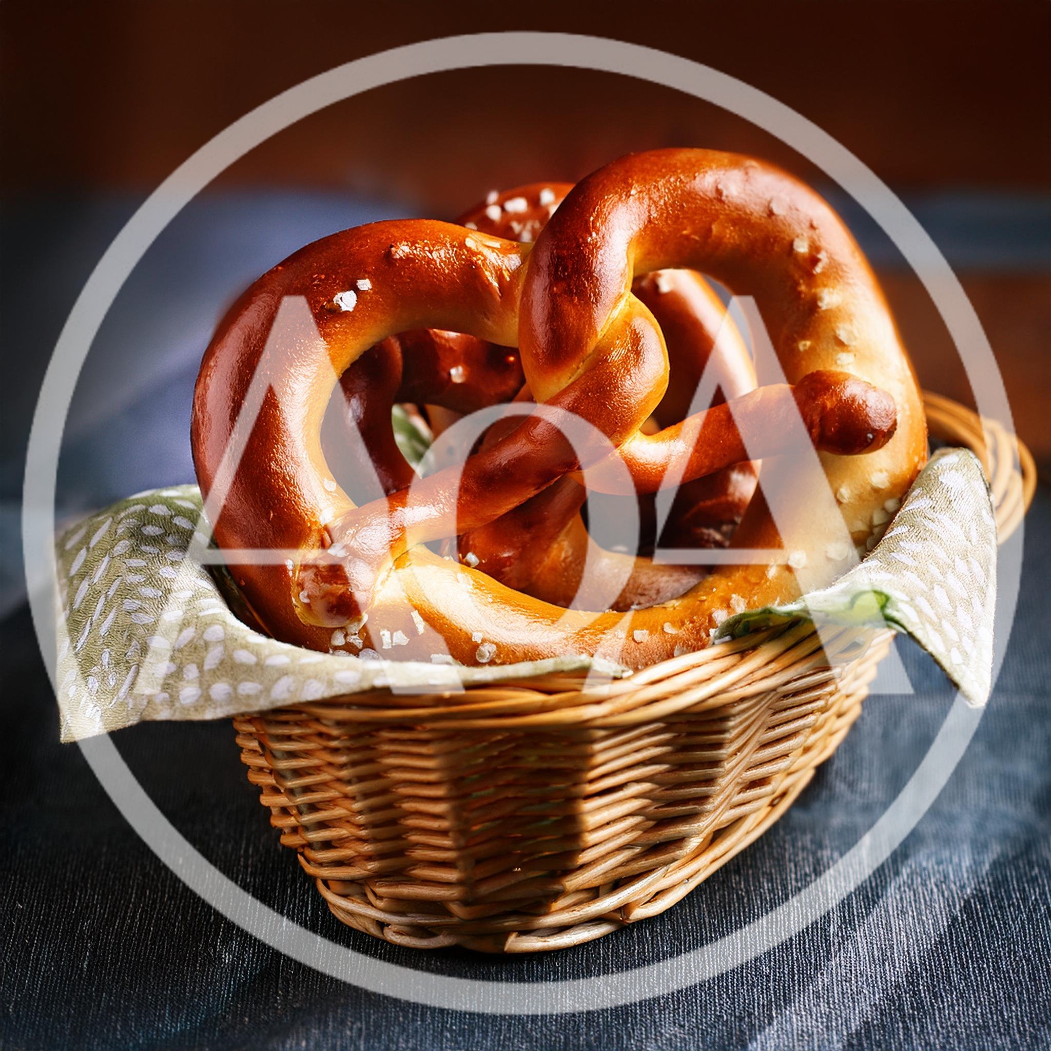Freshly Baked Soft Pretzel In A Wicker Basket