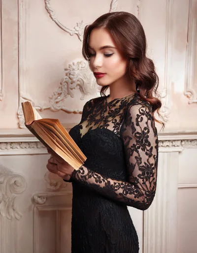 Elegant Woman Reading An Antique Book In A Classic Interior
