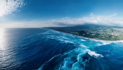 Aerial View Of Tropical Coastline With Crashing Waves