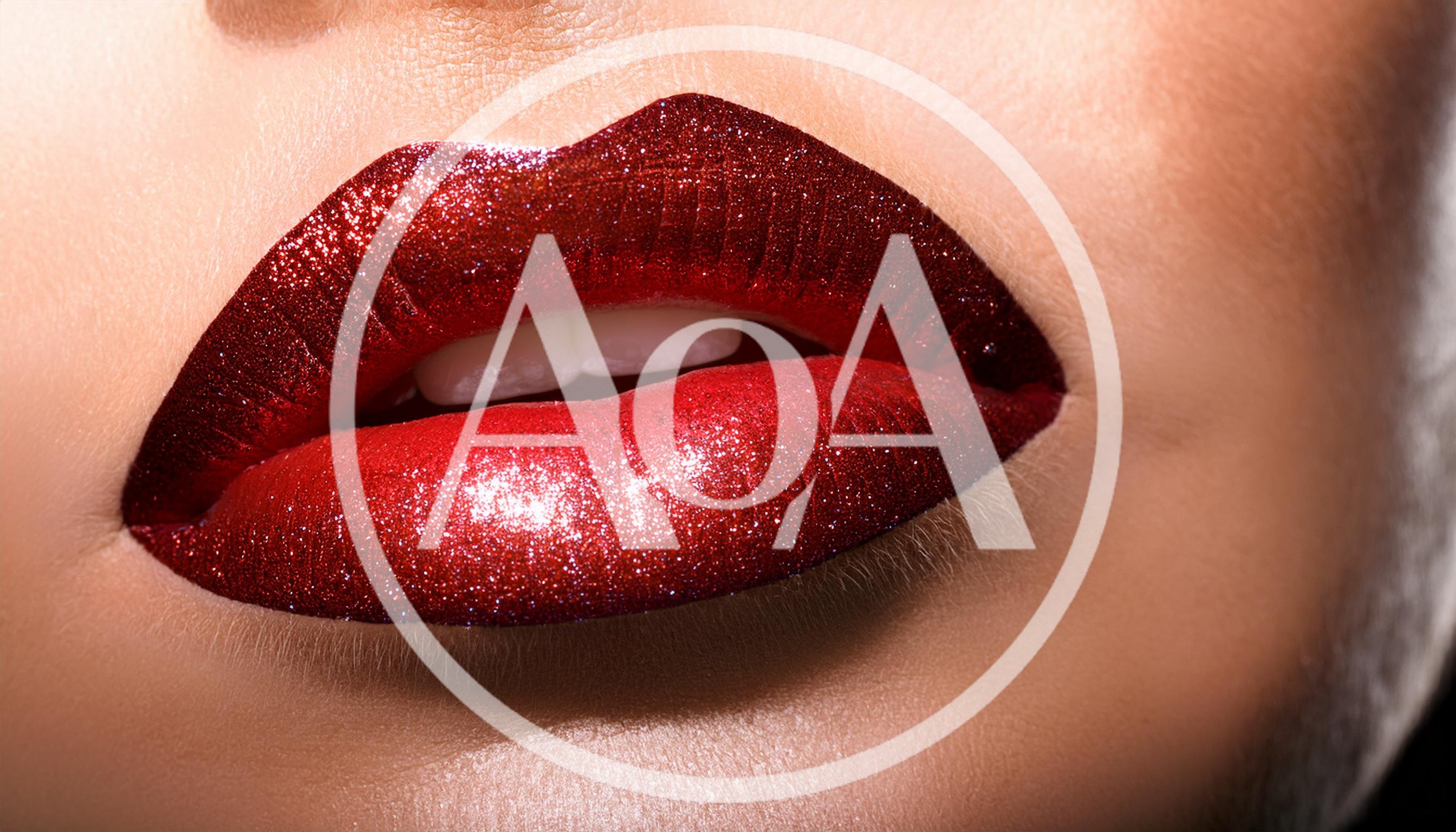 Close Up Of Woman Wearing Red Glitter Lipstick