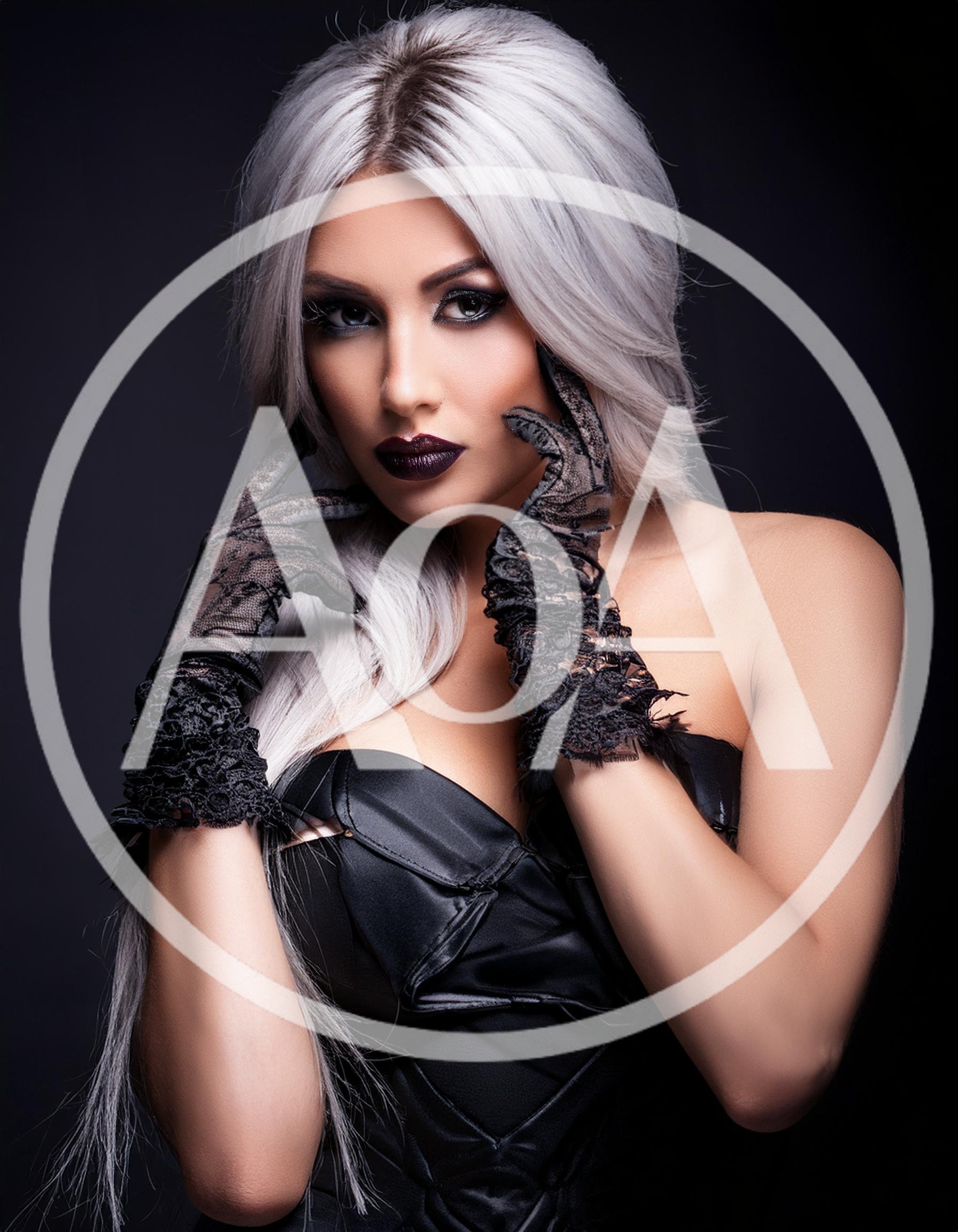 Portrait Of A Woman With Silver Hair And Lace Gloves