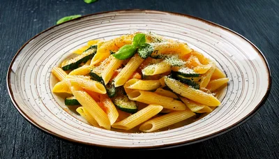 Penne Pasta With Zucchini And Parmesan Cheese