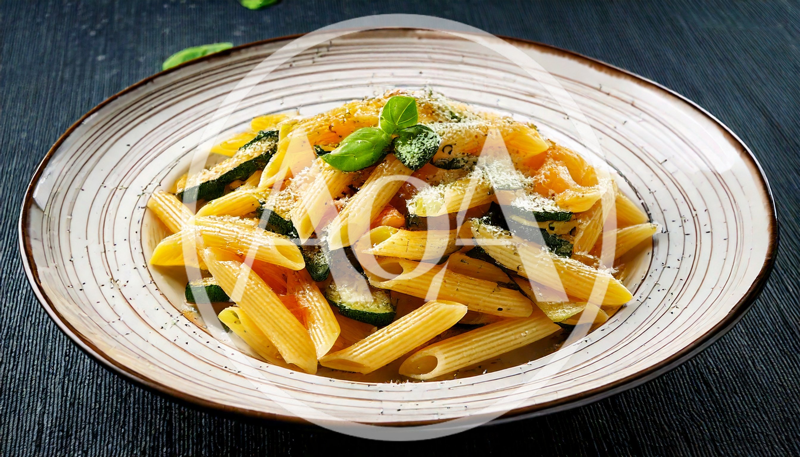 Penne Pasta With Zucchini And Parmesan Cheese