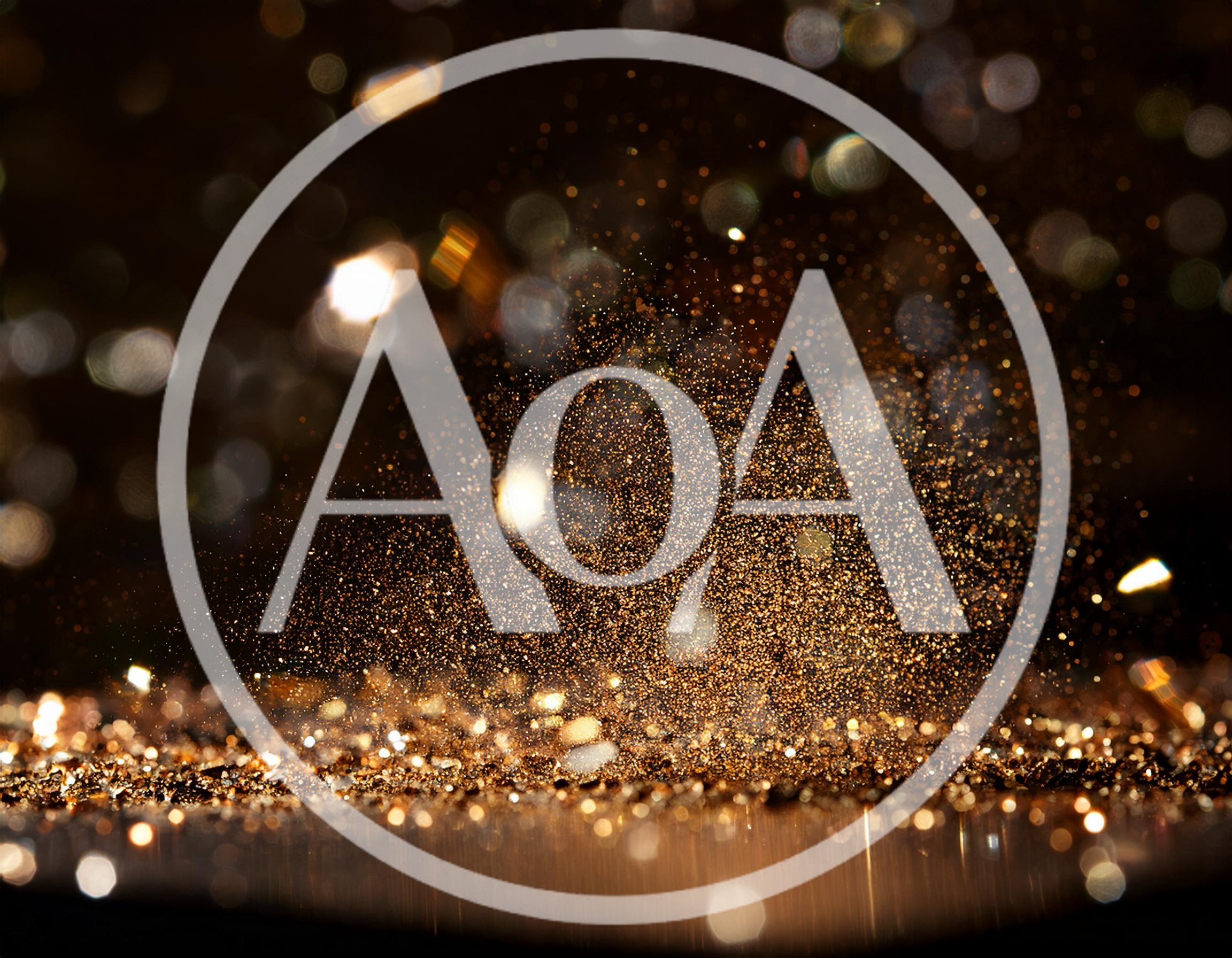 Golden Glitter Particles Exploding Against Dark Background