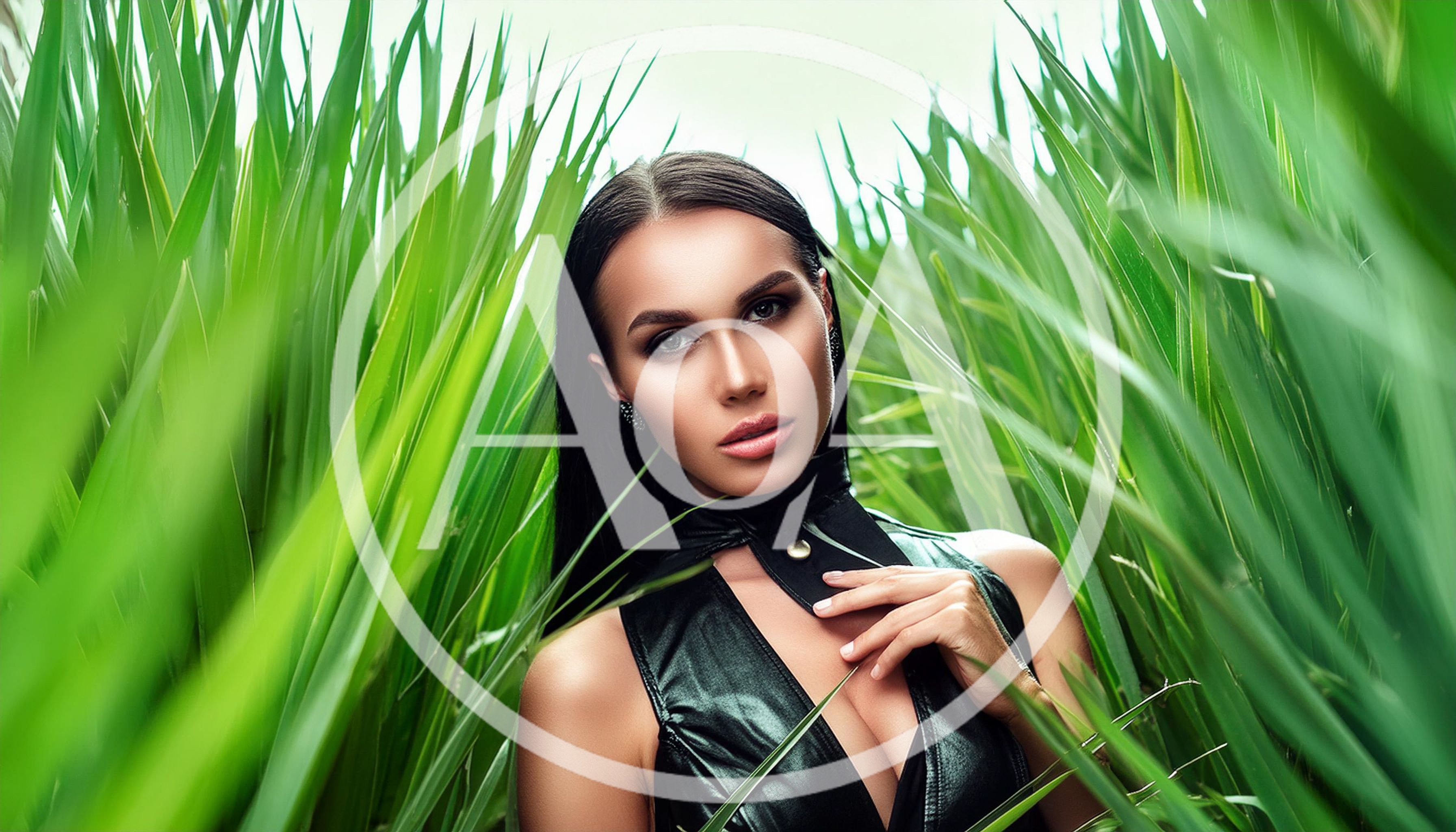 Portrait Of A Beautiful Woman In Tall Green Grass