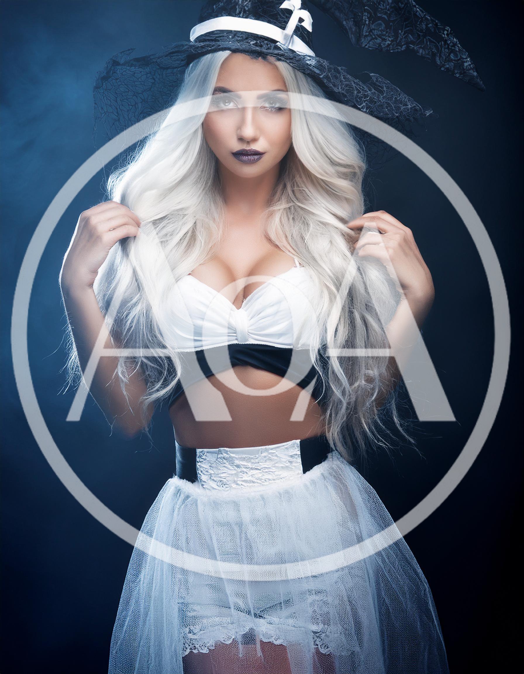 Beautiful Woman Wearing A Witch Costume For Halloween