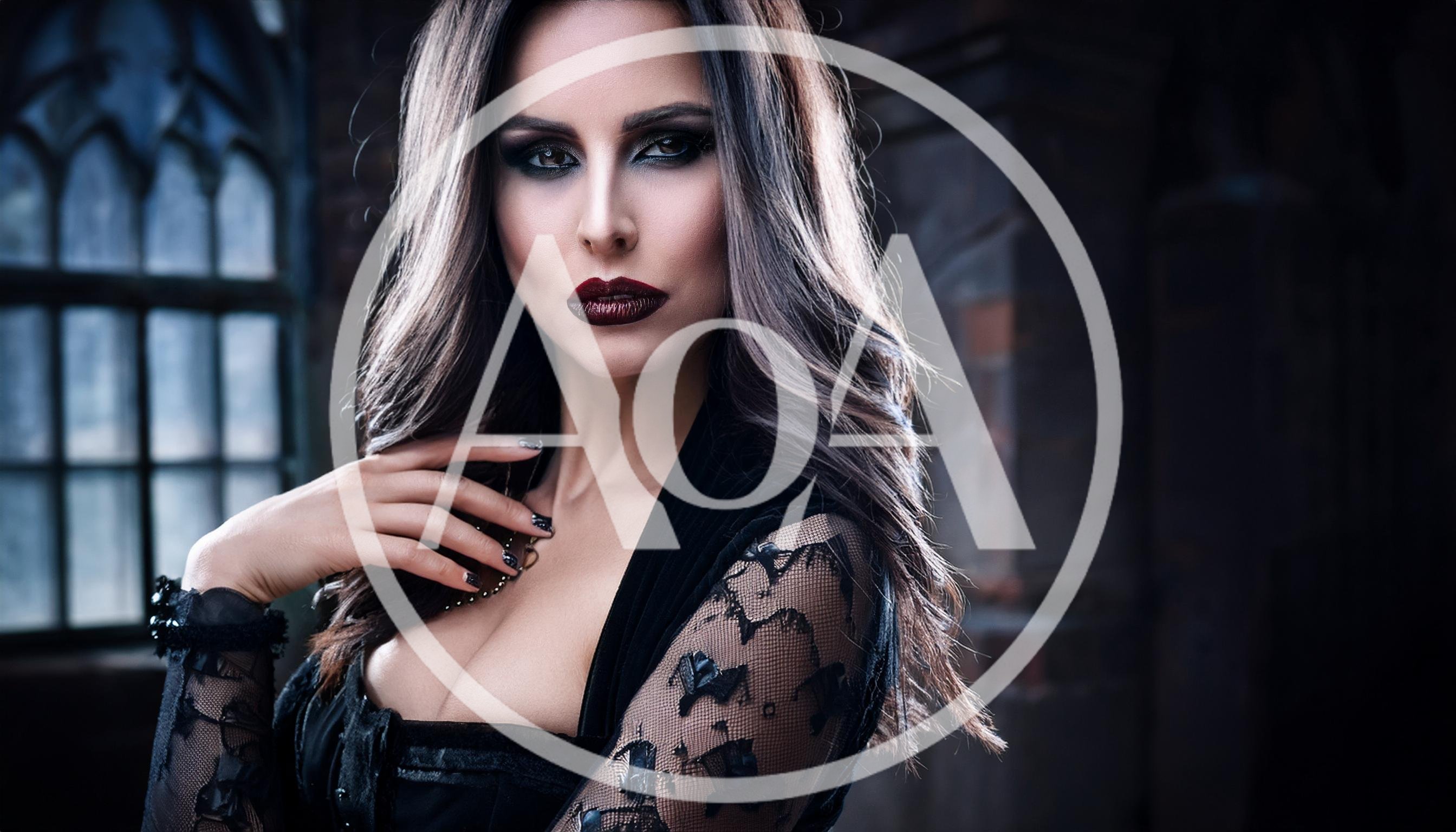 Gothic Woman With Dark Makeup In A Dark Room
