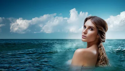 Beautiful Woman Emerging From The Ocean Waters