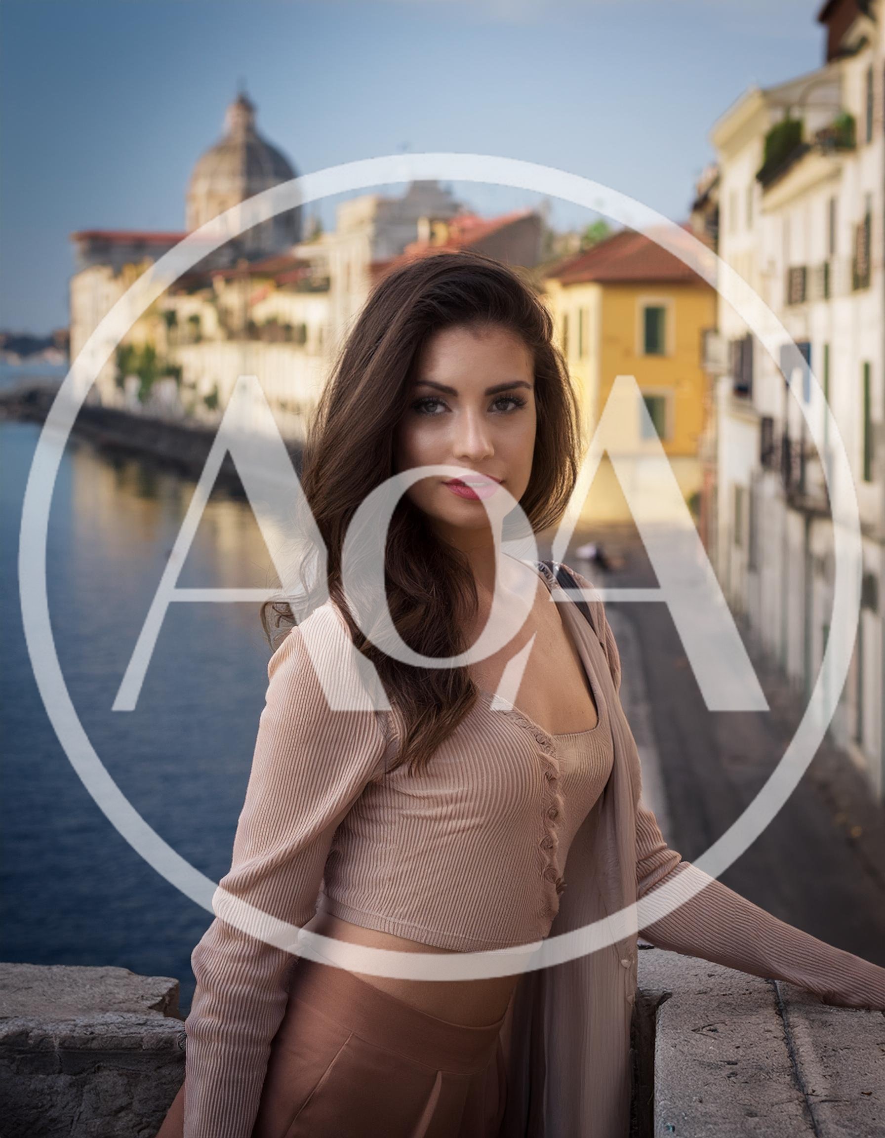 Portrait Of A Young Woman Standing By A River