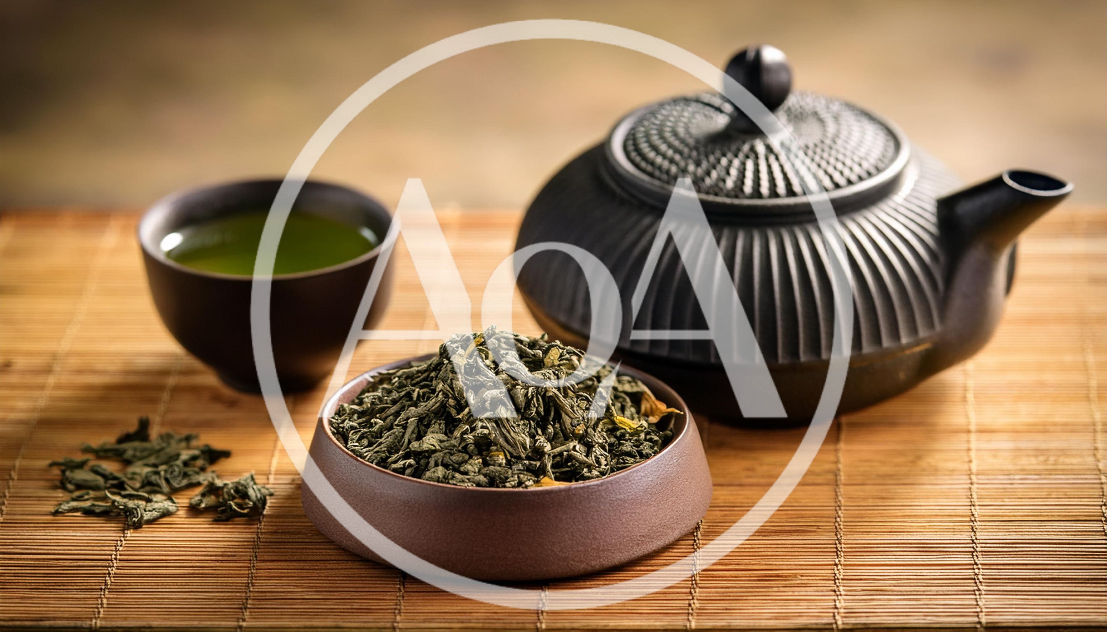 Green Tea Leaves With Teapot And Cup
