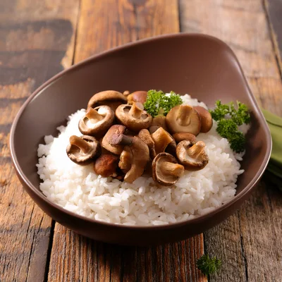 Bowl Of Steamed White Rice With Shiitake Mushrooms