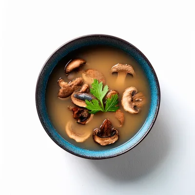 Mushroom Soup In A Blue Ceramic Bowl