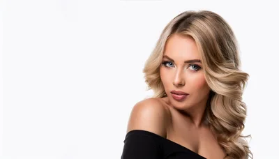 Portrait Of A Beautiful Blonde Woman With Wavy Hair