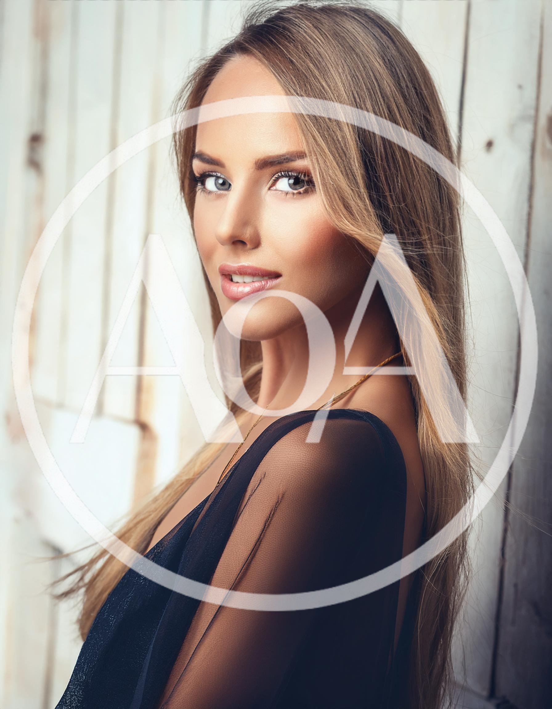 Portrait Of A Beautiful Young Woman With Long Blonde Hair